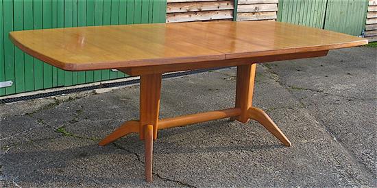 Gordon Russell, extending teak dining table with ten chairs including two carvers W.230cm